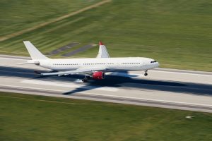 airplane-landing-on-airport-runway