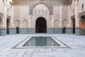 view-of-a-courtyard-of-an-islamic-palace-in-morocco-small-pool-in-the-centre-marble